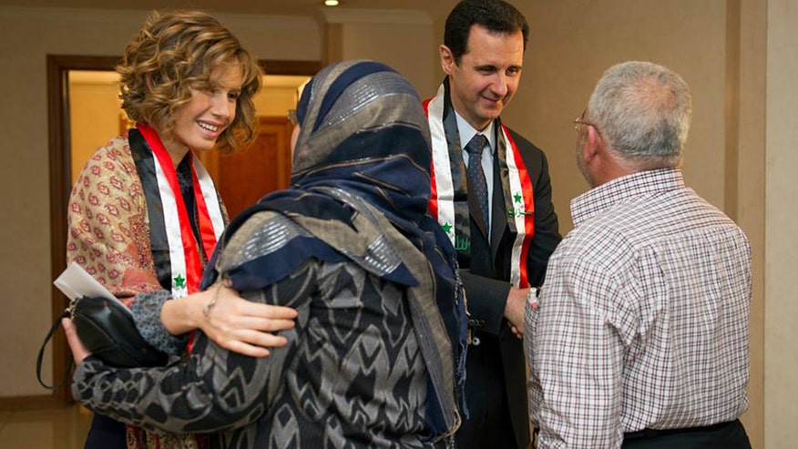 Mideast Syria RunningAssad.jpg